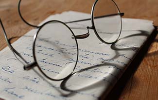 Glasses and written notes
