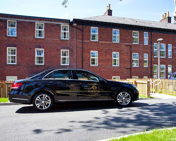Exterior of House with Chauffeur Car