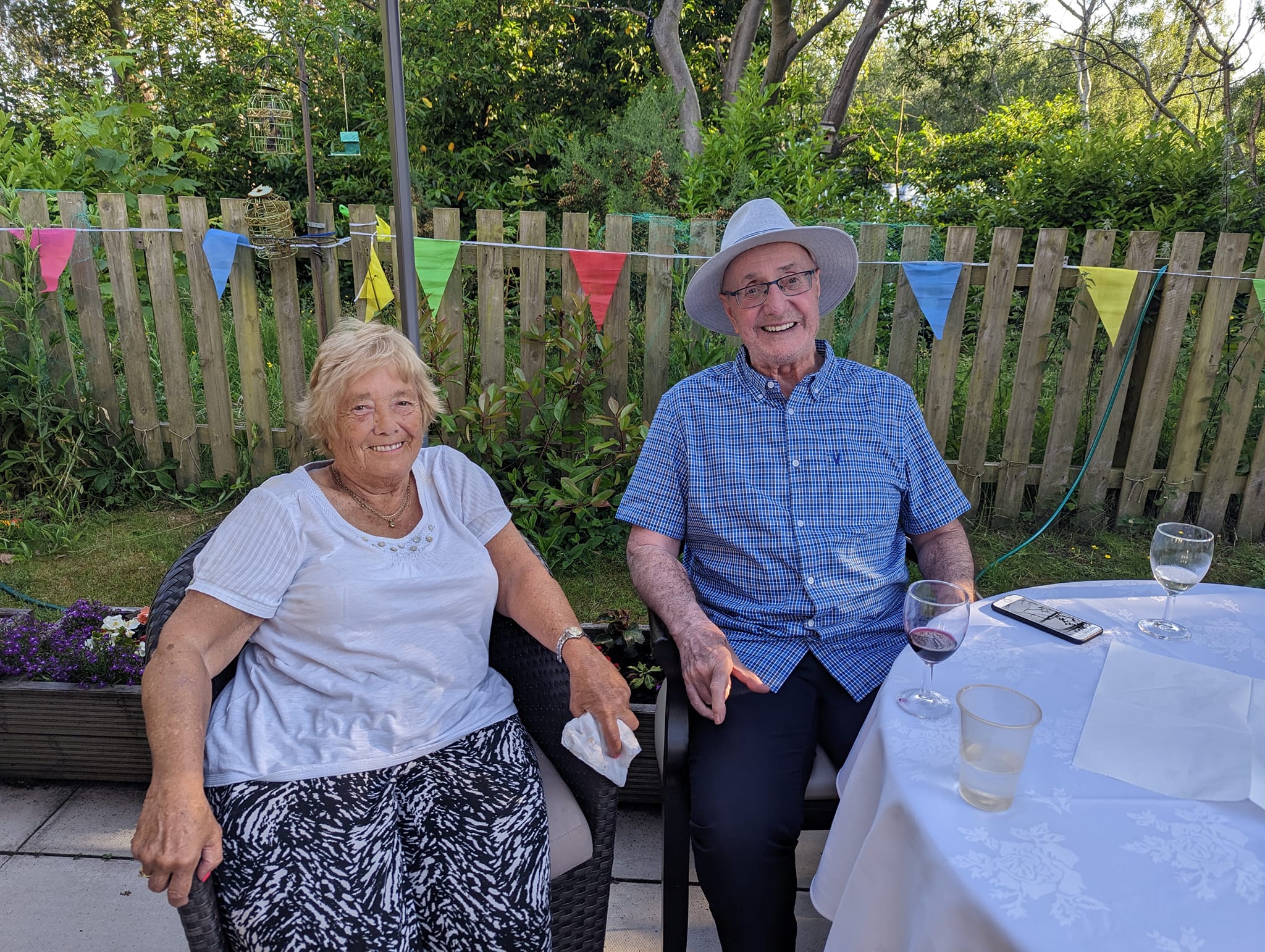 Residents sat outside for our glad to care week party at Hazelwell Care Home