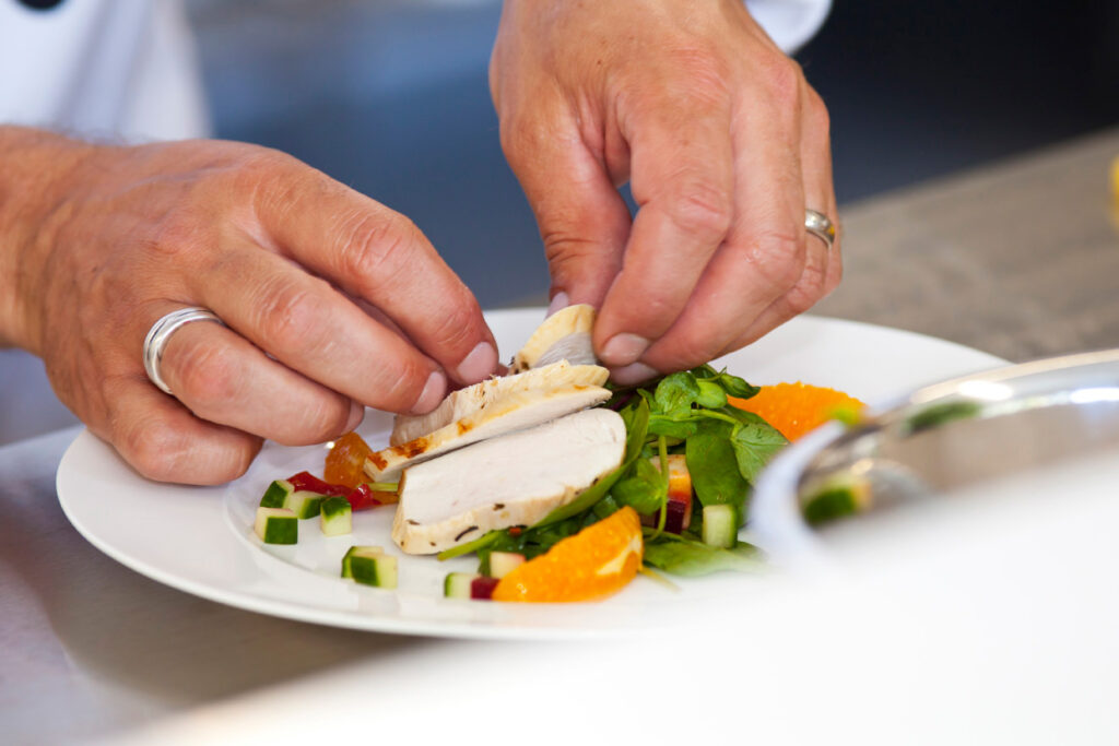 Our inhouse chef preparing a chicken salad