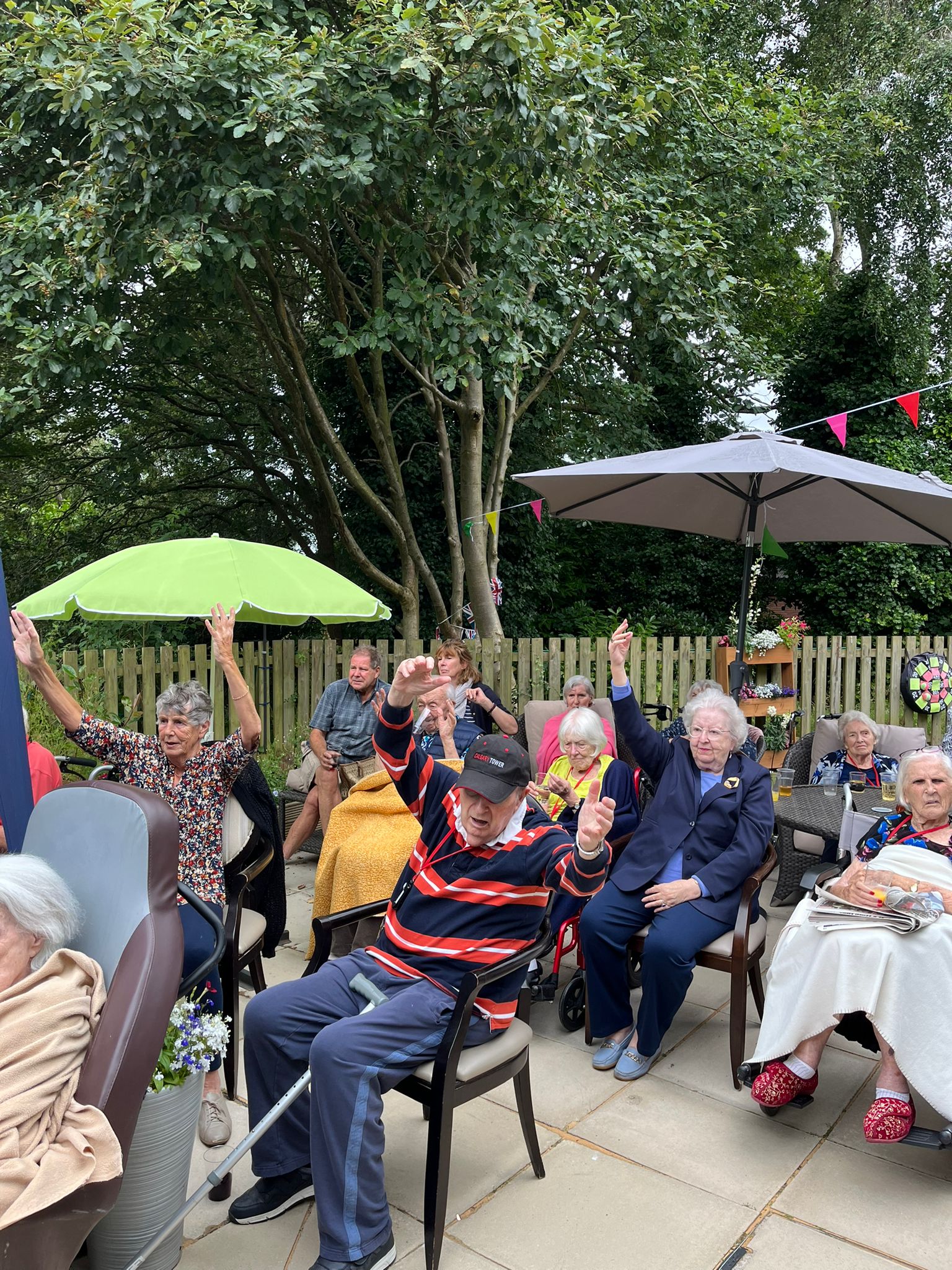 residents sat outside together