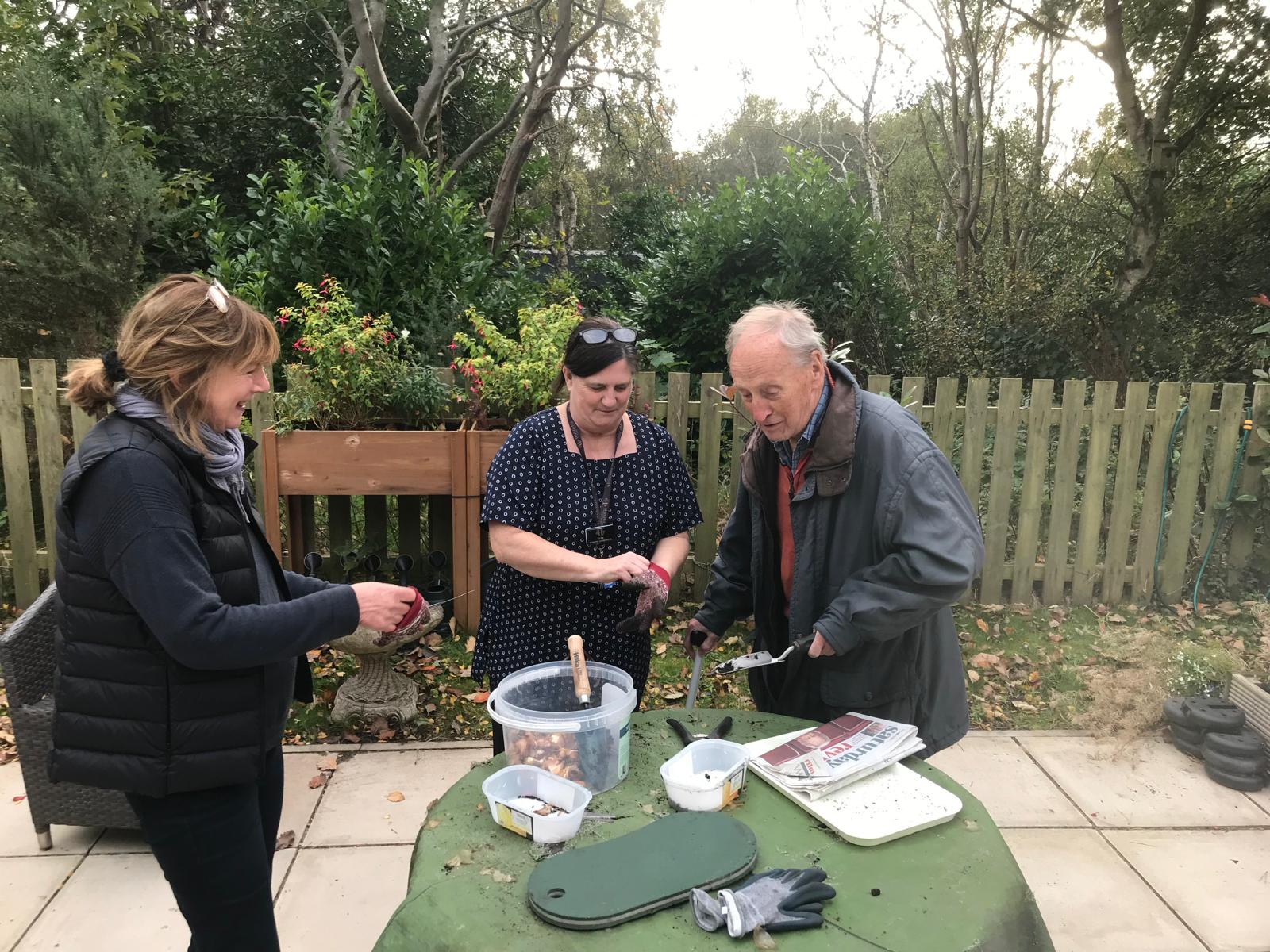 residents planting daffodills