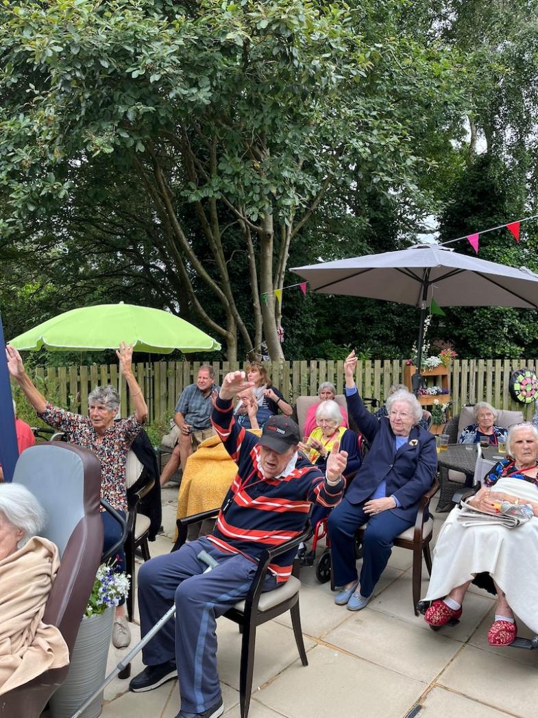 residents sat together in the garden