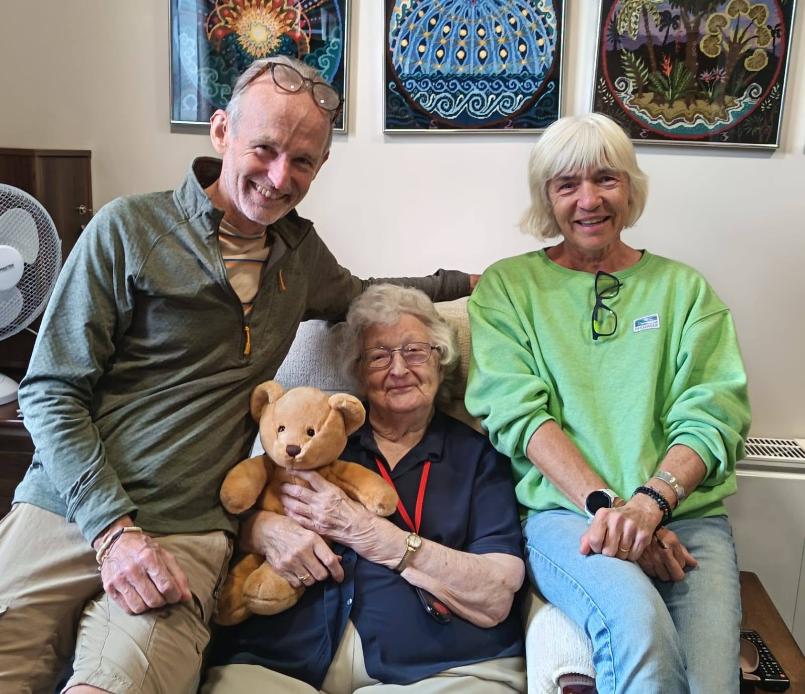 older adults sat on a chair